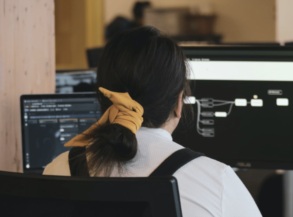 woman in front of computer screen